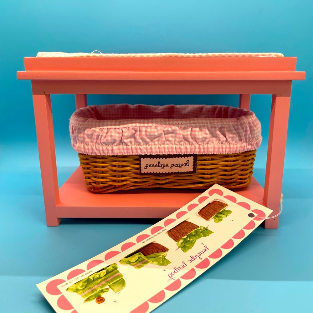 Penelope Peapod changing table with gingham cushion and matching lined basket!
